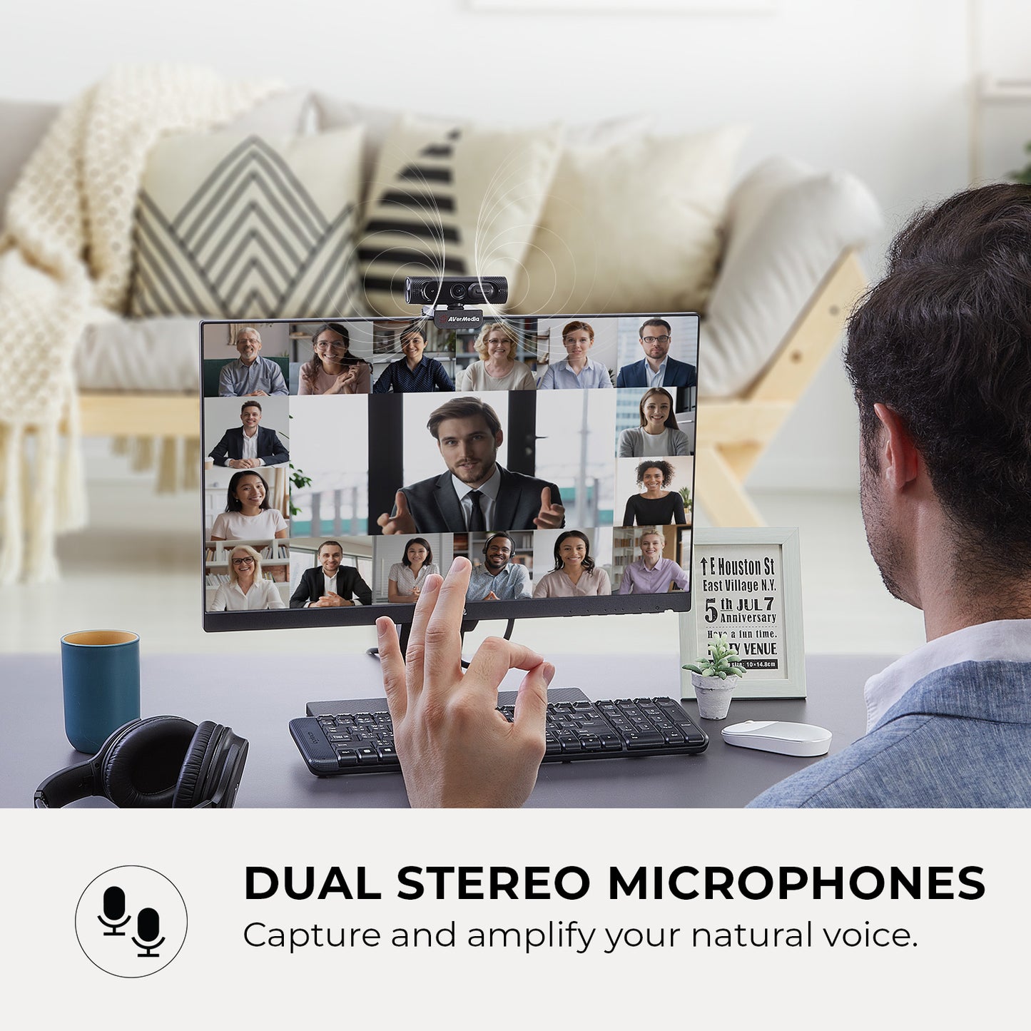 Man having video call with built-in mic on Wide Angle Webcam